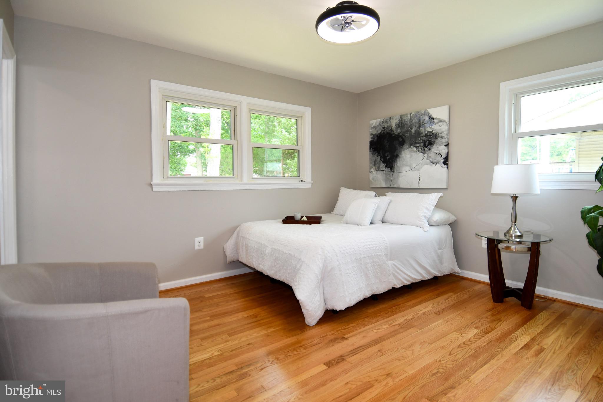 9616 Small Drive Clinton, MD 20735 - Photo 32 of 50 a bedroom with a bed and a window