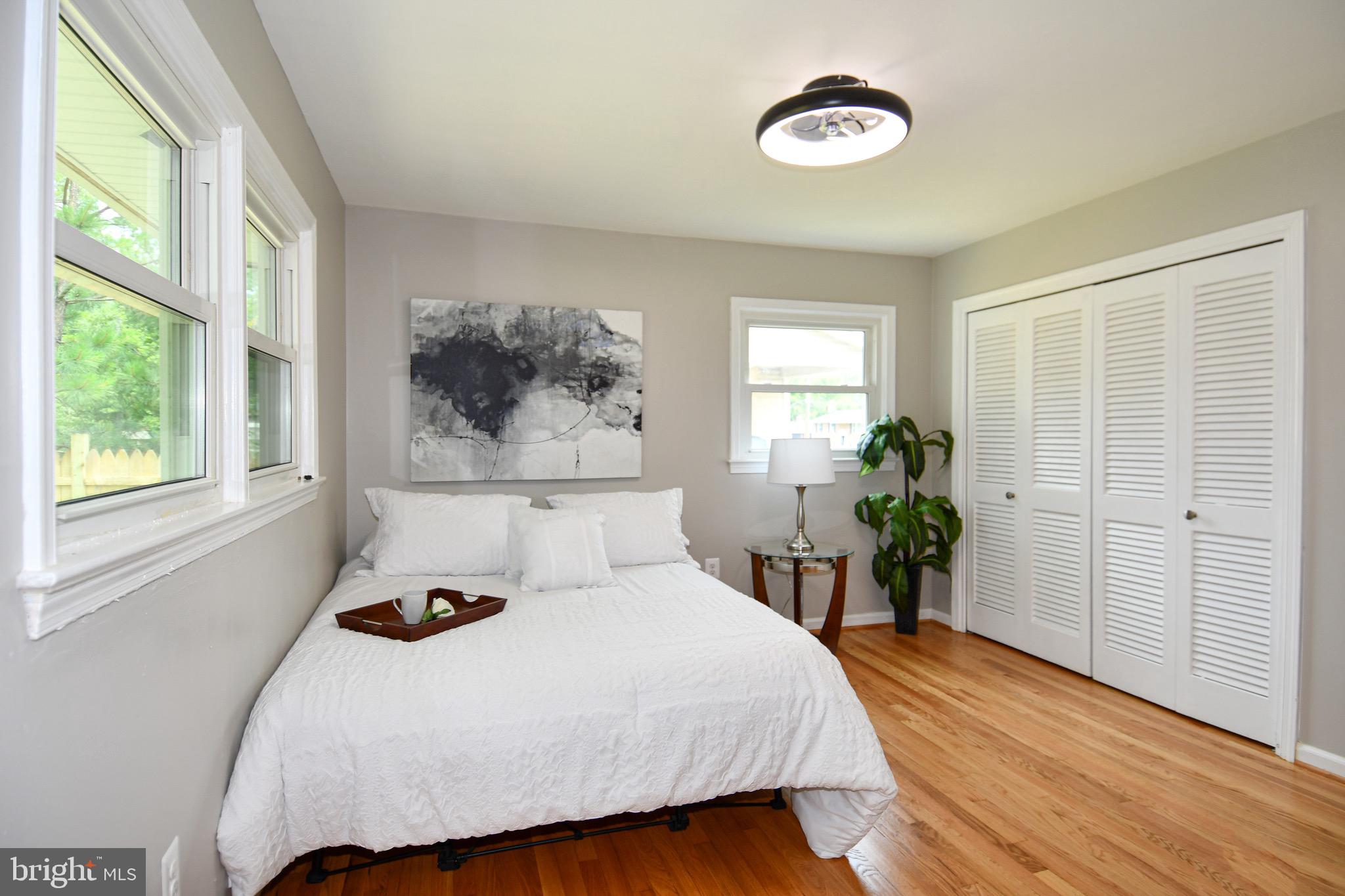 9616 Small Drive Clinton, MD 20735 - Photo 34 of 50 a bedroom with a bed and a window