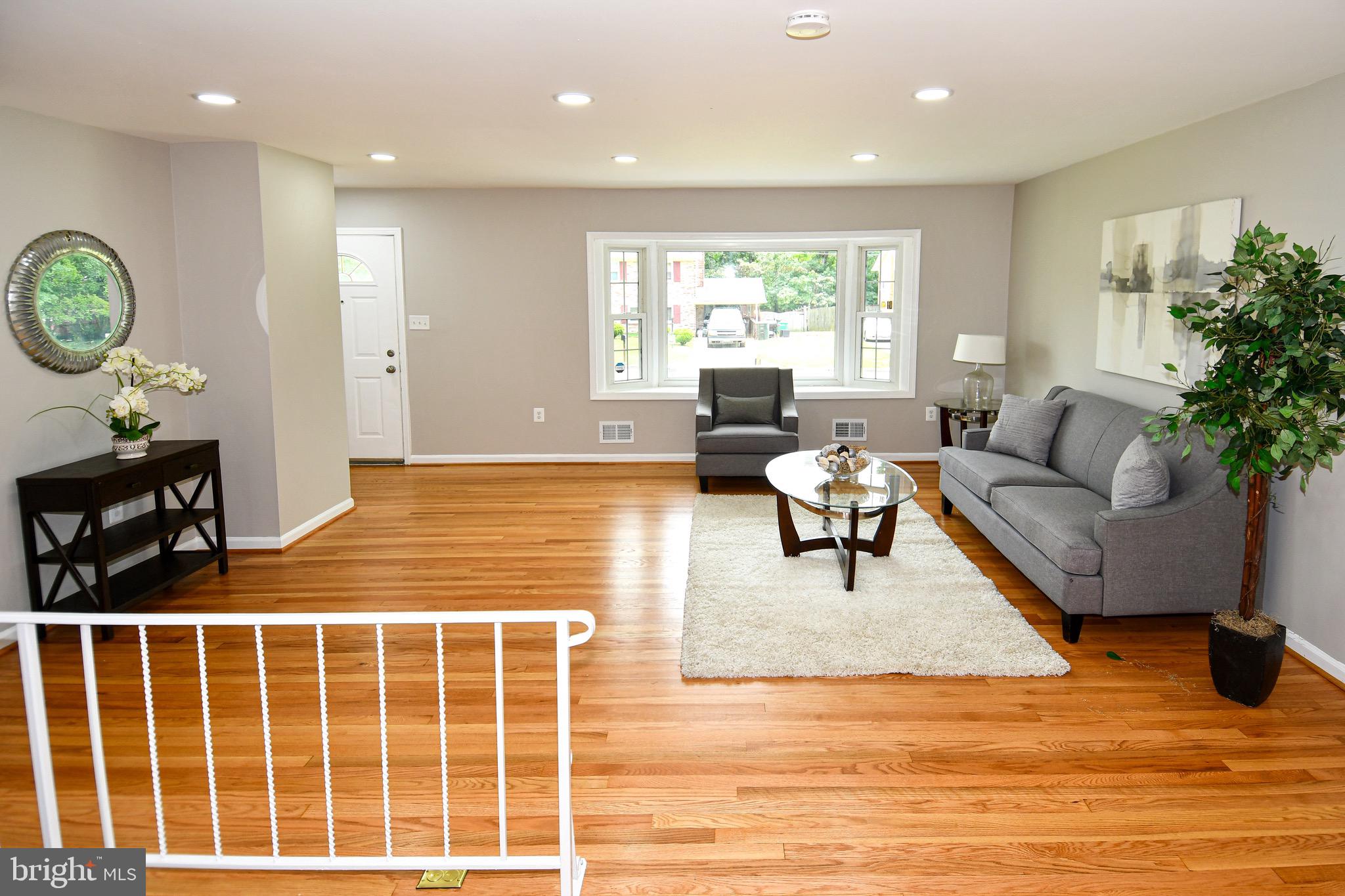 9616 Small Drive Clinton, MD 20735 - Photo 4 of 50 a living room with furniture and a large window