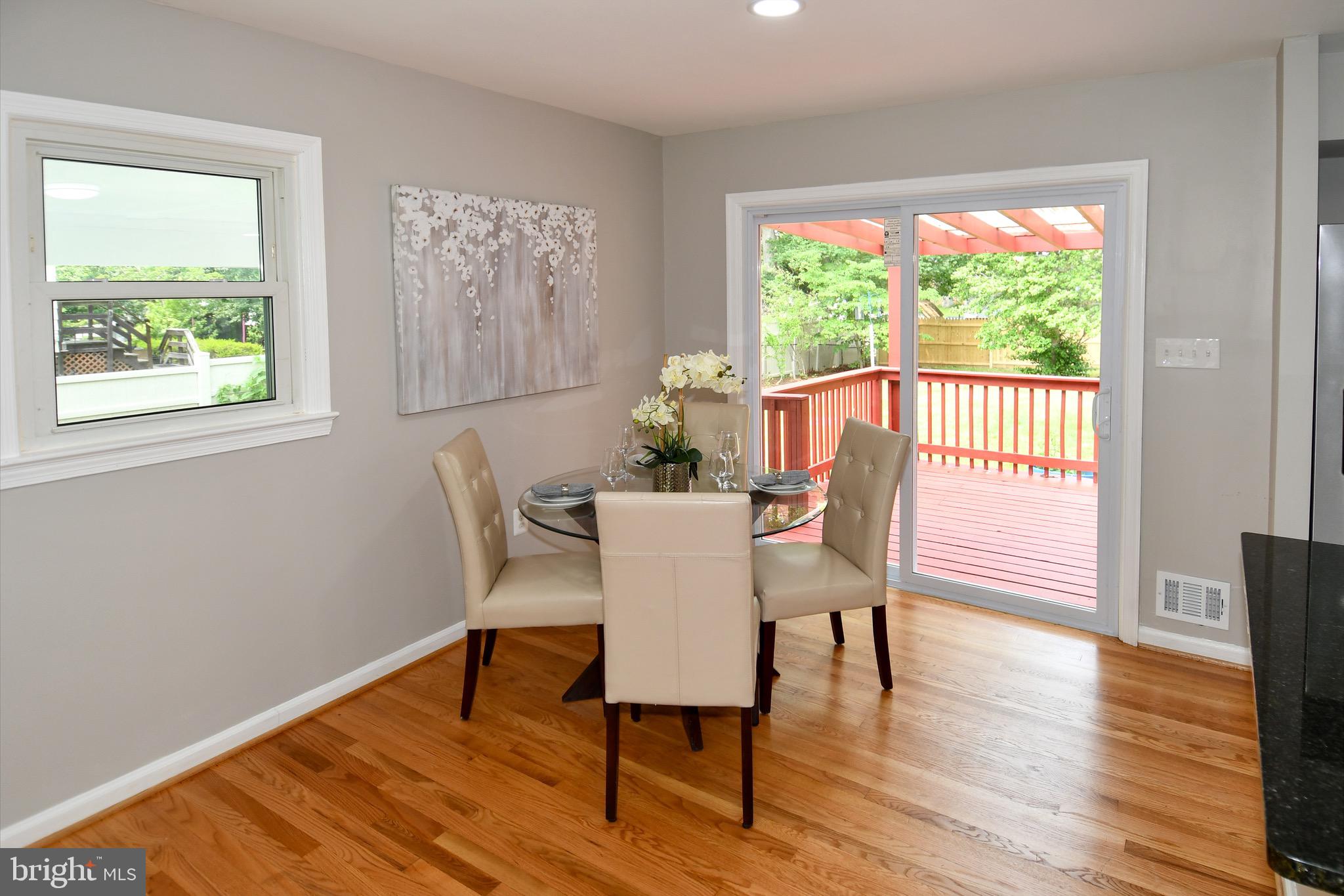 9616 Small Drive Clinton, MD 20735 - Photo 10 of 50 a view of a dining room with furniture window and wooden floor