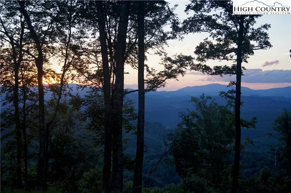 a view of mountain view with lots of trees