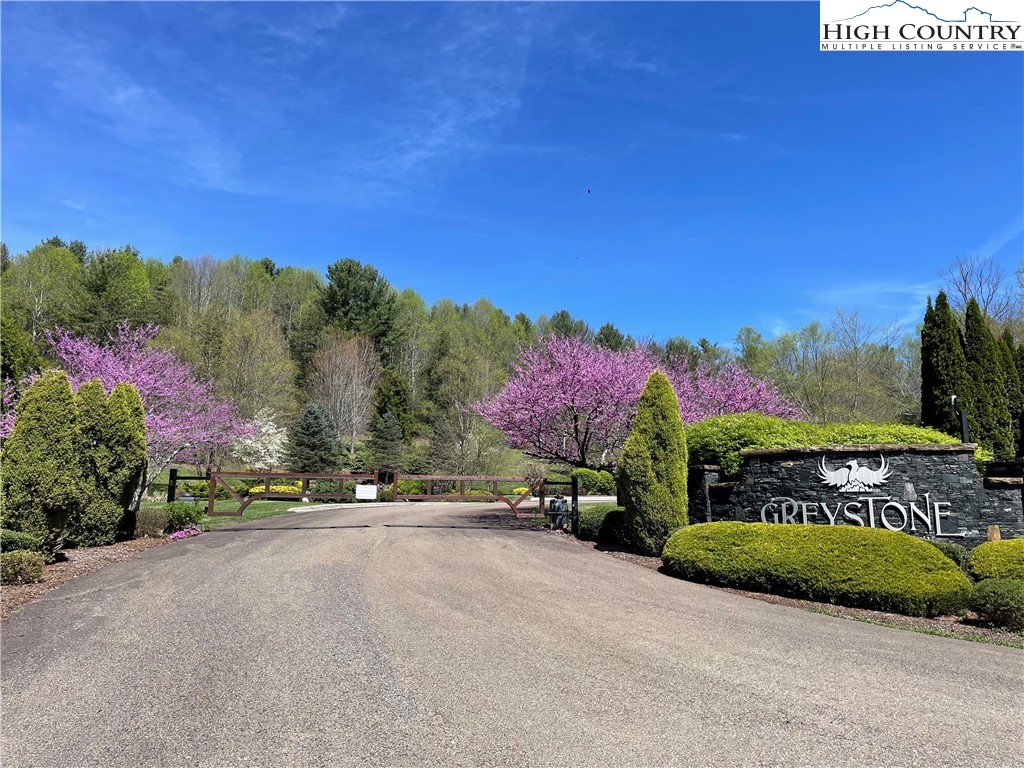 Lot#2 Olde Stone Ridge Lansing, NC 28643 - Photo 11 of 21 a sign board with buildings in the background