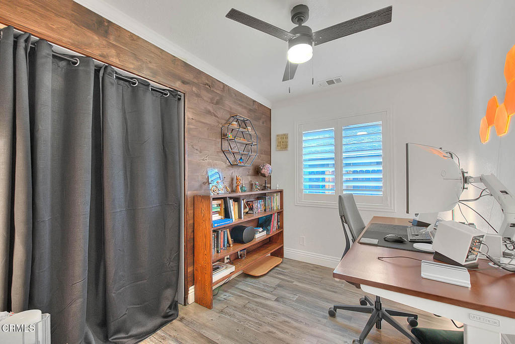 420 West 3rd Street San Dimas, CA 91773 - Photo 12 of 19 a view of a workspace with furniture and a window