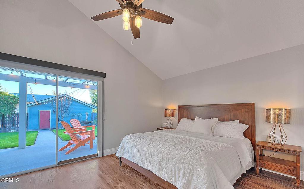 420 West 3rd Street San Dimas, CA 91773 - Photo 14 of 19 a bedroom with a bed and a painting on the wall