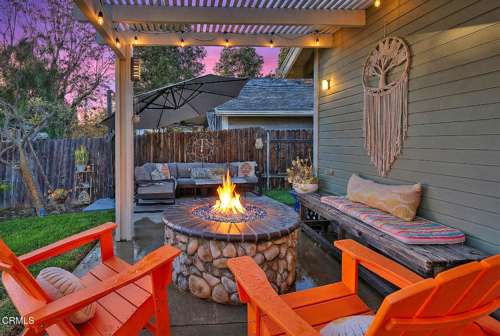 420 West 3rd Street San Dimas, CA 91773 - Photo 4 of 19 a backyard of a house with garden and outdoor seating