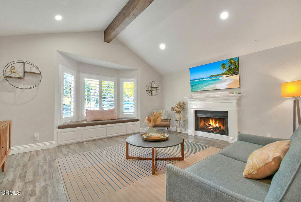 420 West 3rd Street San Dimas, CA 91773 - Photo 5 of 19 a living room with furniture and a fireplace