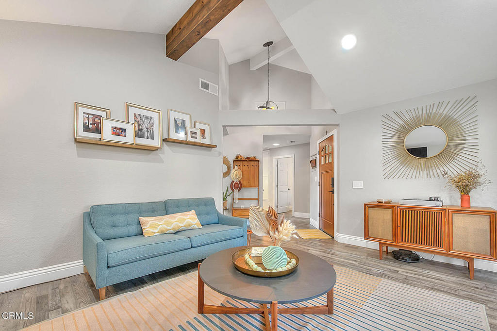 420 West 3rd Street San Dimas, CA 91773 - Photo 9 of 19 a living room with furniture and wooden floor