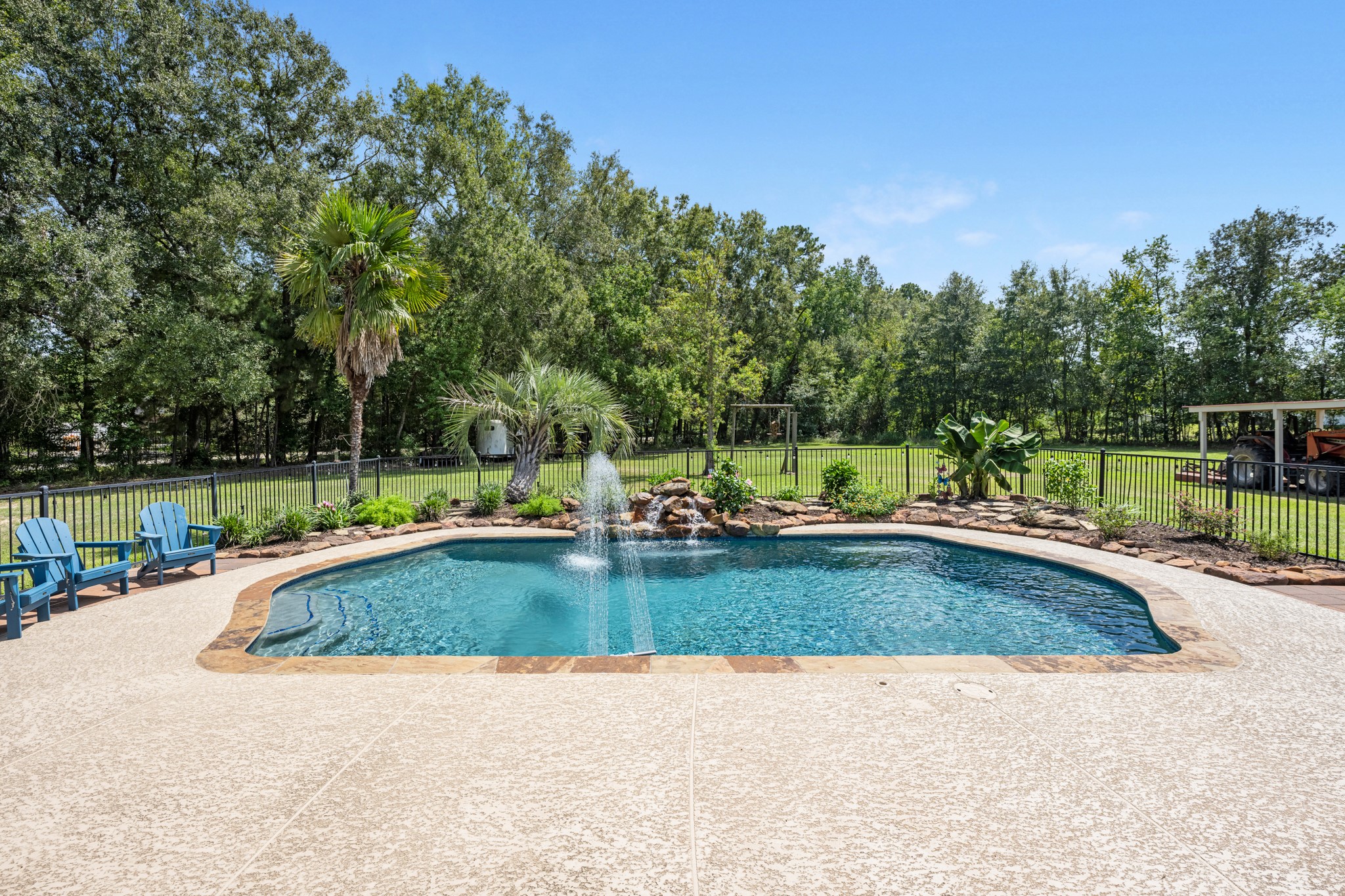 22698 Brook Forest Road New Caney, TX 77357 - Photo 36 of 46 Plenty of room around the pool for entertaining, relaxing and soaking up the Texas sunshine!