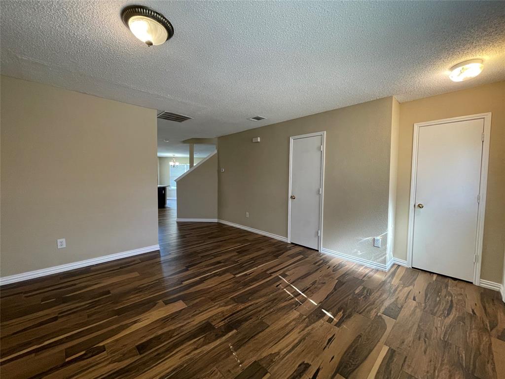 4855 Diamond Trace Trail Fort Worth, TX 76244 - Photo 11 of 21 a view of a livingroom with wooden floor