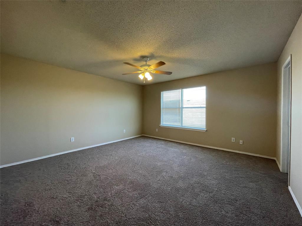 4855 Diamond Trace Trail Fort Worth, TX 76244 - Photo 13 of 21 a view of an empty room with a window