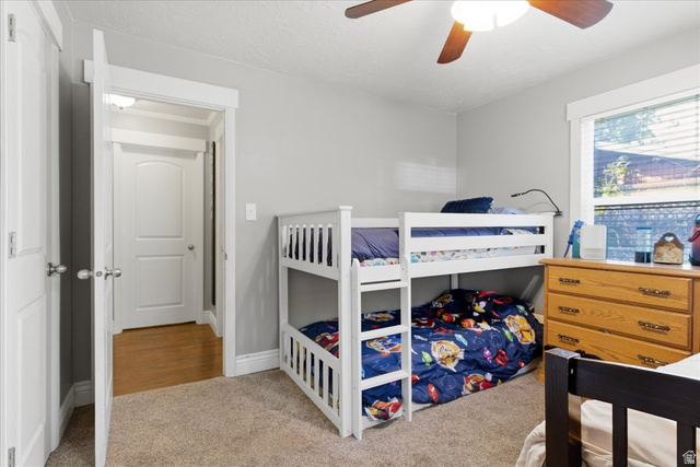 170 North 200 West Springville, UT 84663 - Photo 7 of 13 Carpeted room featuring light gray walls, white trim, and a ceiling fan with light fixture