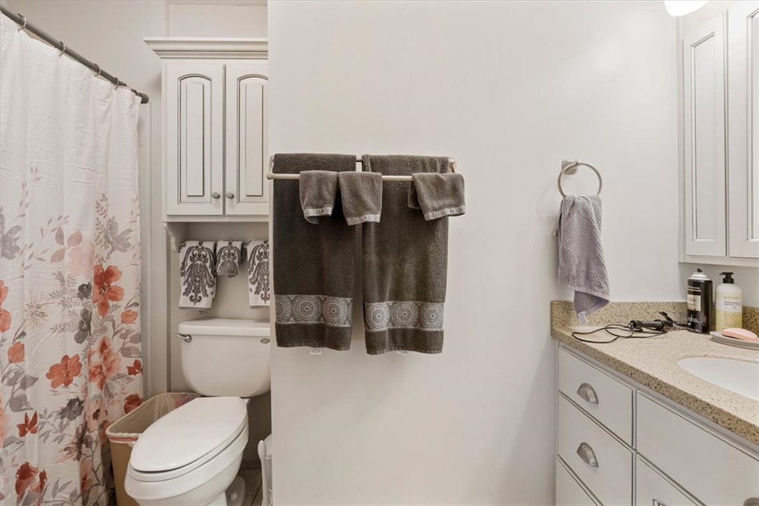 7225 Garber Road Clayton, OH 45415 - Photo 16 of 33 This bathroom offers convenient storage and a clean, functional design.