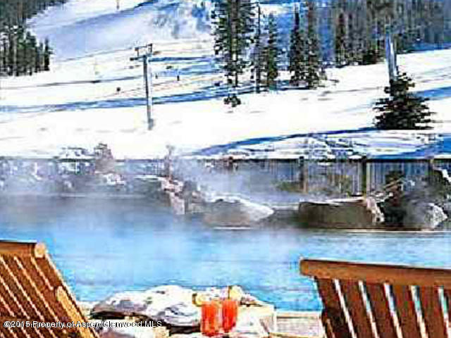 75 Prospector Road, Unit 2412 WINTER INT #3 Aspen, CO 81611 - Photo 1 of 4 Ritz Carlton Club Aspen Outdoor pool vie