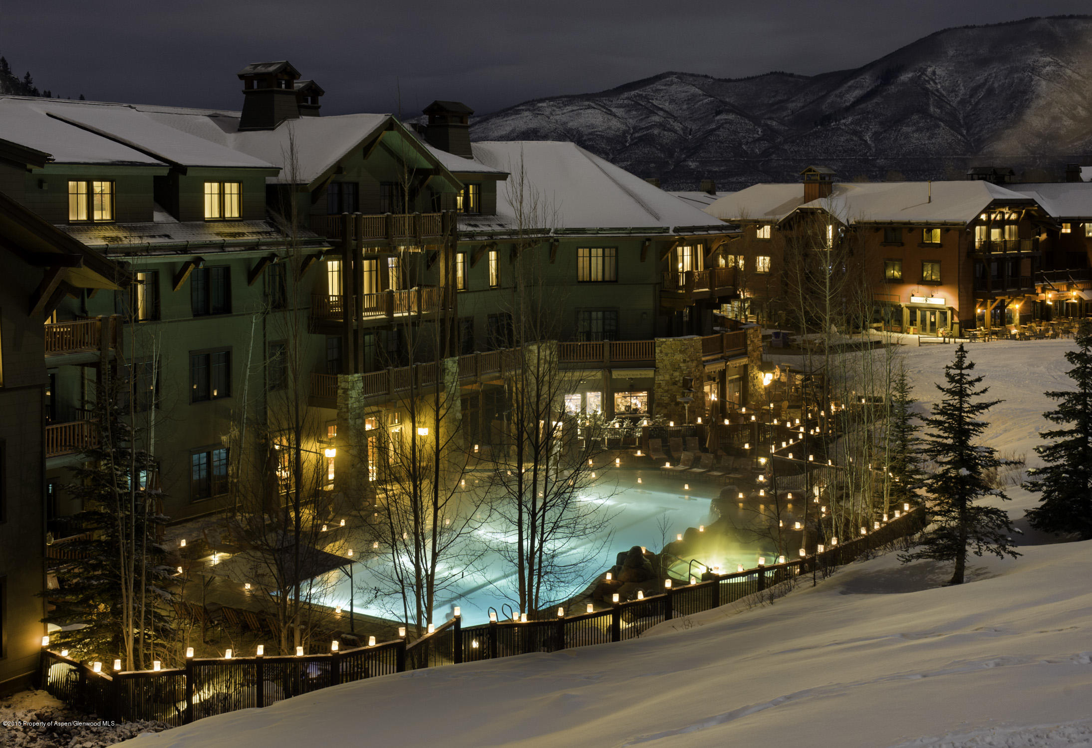 75 Prospector Road, Unit 2412 WINTER INT #3 Aspen, CO 81611 - Photo 3 of 4 night exterior _13032310