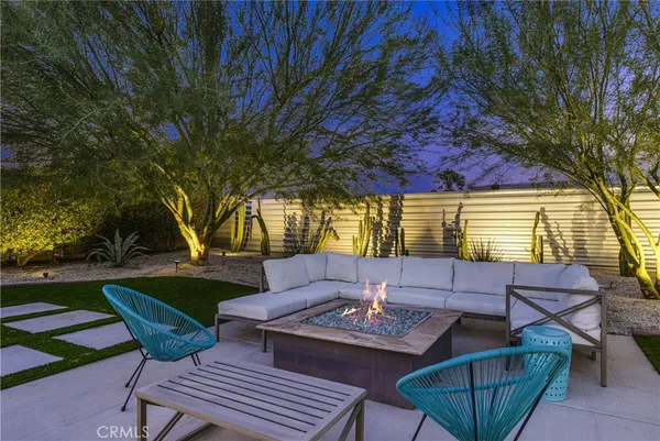 a view of yard with patio