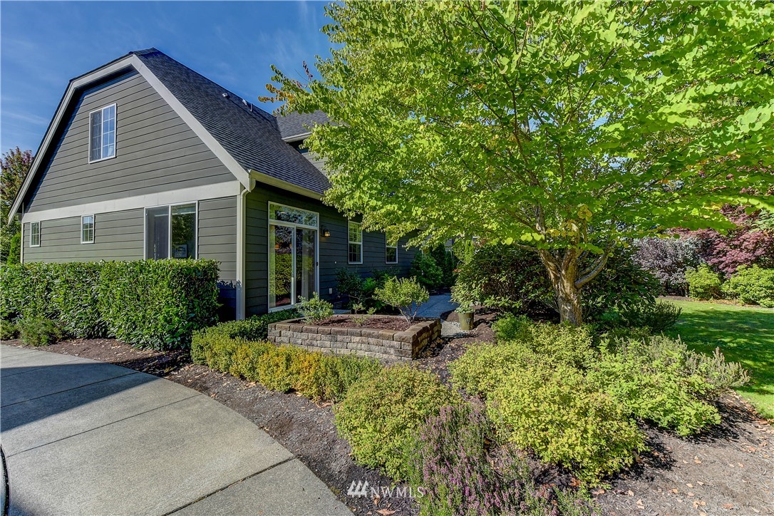 21802 38th Drive Southeast Bothell, WA 98021 - Photo 2 of 26 a backyard of a house with seating space
