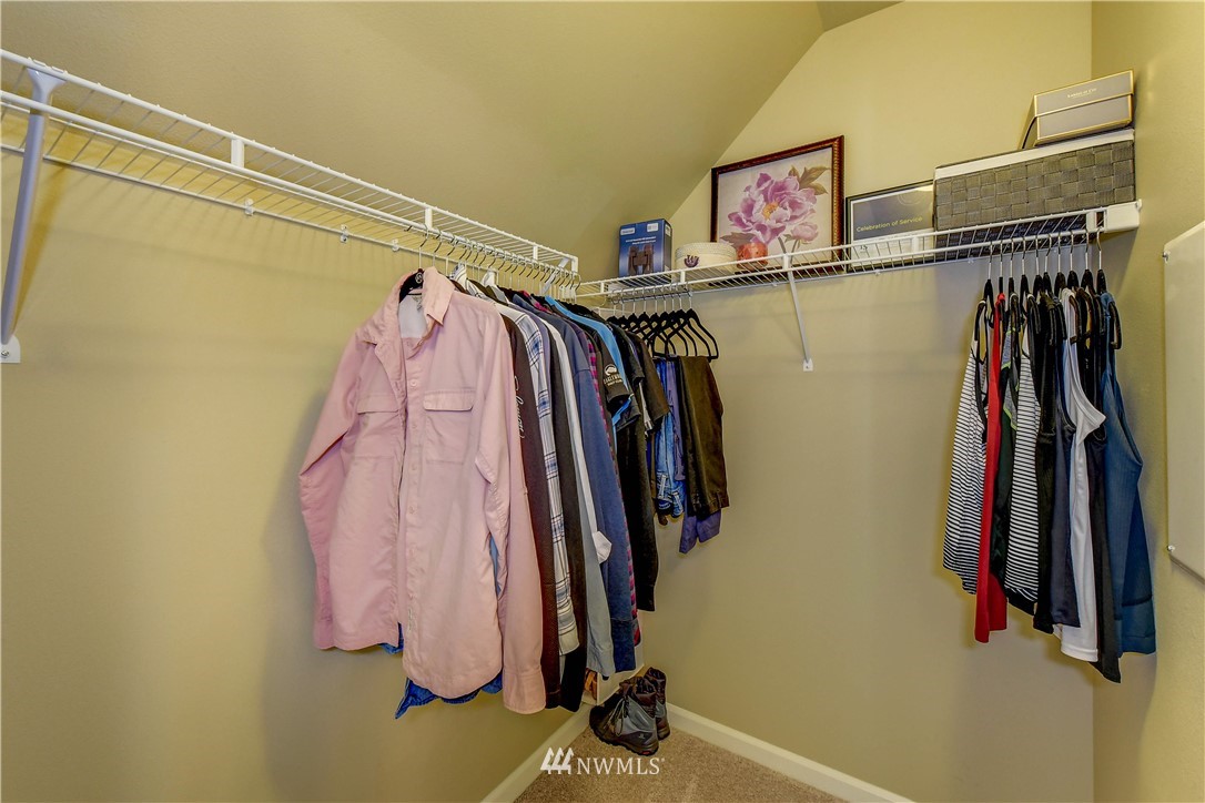 21802 38th Drive Southeast Bothell, WA 98021 - Photo 14 of 26 a view of walk in closet with clothes
