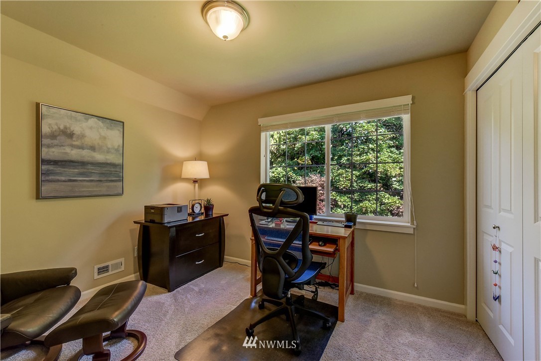 21802 38th Drive Southeast Bothell, WA 98021 - Photo 19 of 26 a workspace with furniture and a window