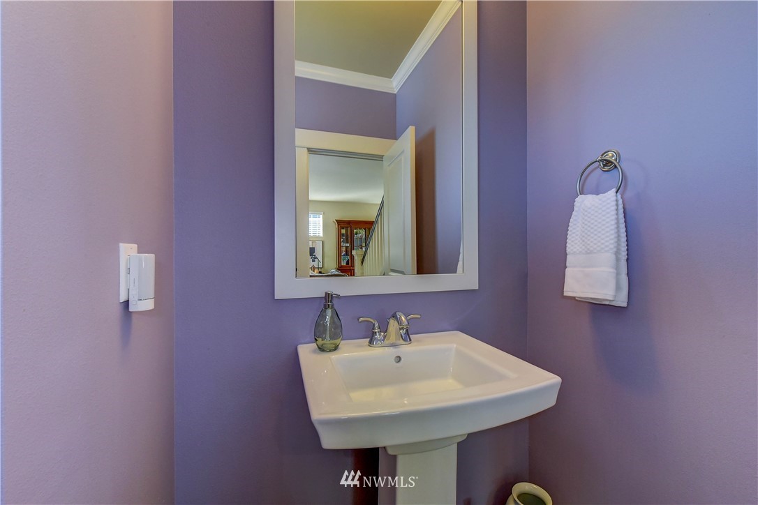 21802 38th Drive Southeast Bothell, WA 98021 - Photo 20 of 26 a bathroom with a sink and a mirror