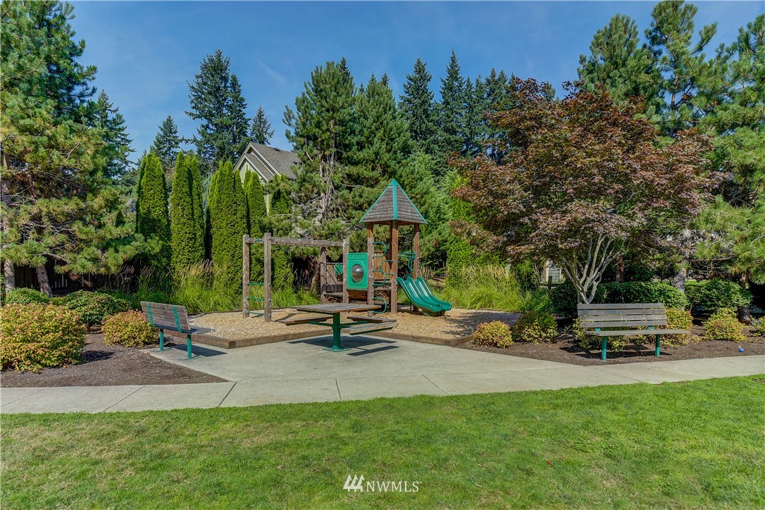 21802 38th Drive Southeast Bothell, WA 98021 - Photo 25 of 26 a view of a park with swings and slides