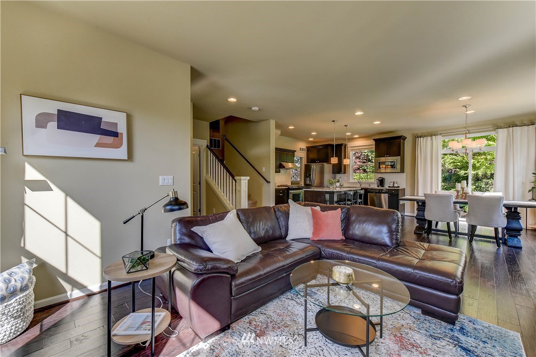 21802 38th Drive Southeast Bothell, WA 98021 - Photo 9 of 26 a living room with furniture and wooden floor