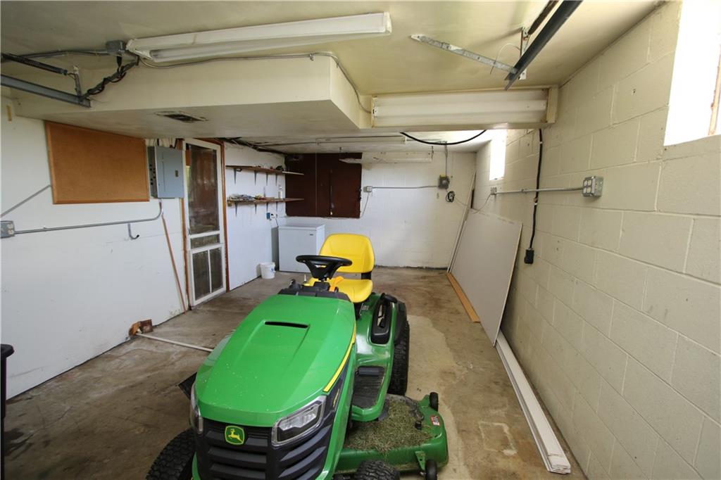 66 Blair Road Eighty Four, PA 15330 - Photo 21 of 26 Spacious 1 Car Integral Garage (sorry, tractor not included)