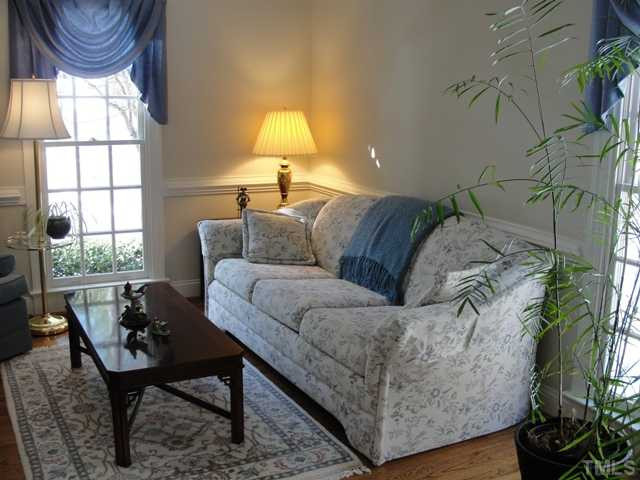 6212 Rein Street Raleigh, NC 27613 - Photo 2 of 12 Hardwood floors. Open to the family room. Living Room