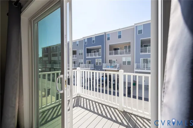 a view of a brick building from a balcony