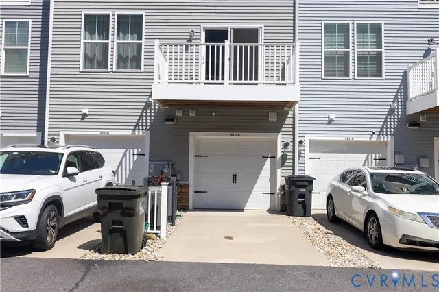 a view of a car parked in front of a house
