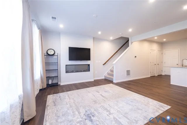 a view of a livingroom with a staircase