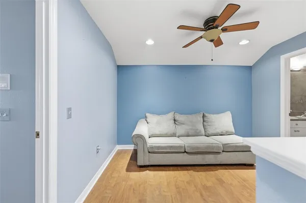a view of an empty room with a window