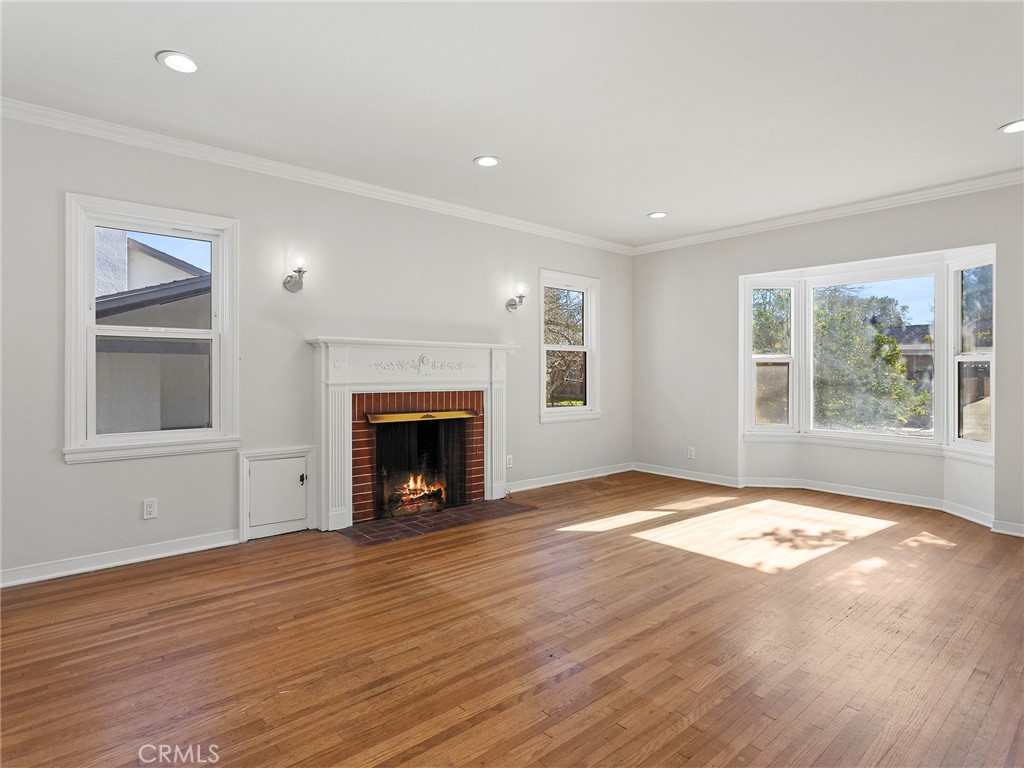 2739 Millicent Way Pasadena, CA 91107 - Photo 18 of 49 a view of an empty room with window and wooden floor