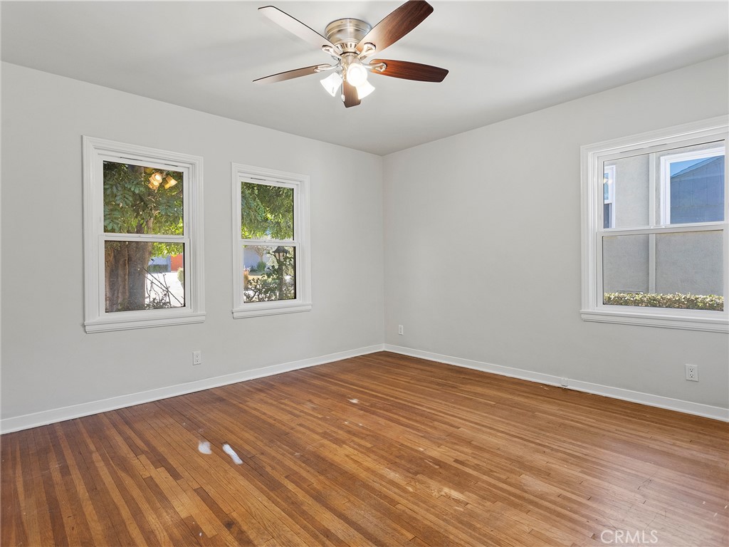 2739 Millicent Way Pasadena, CA 91107 - Photo 21 of 49 a view of empty room with wooden floor and fan