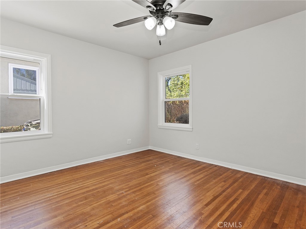 2739 Millicent Way Pasadena, CA 91107 - Photo 22 of 49 a view of an empty room with wooden floor and a window