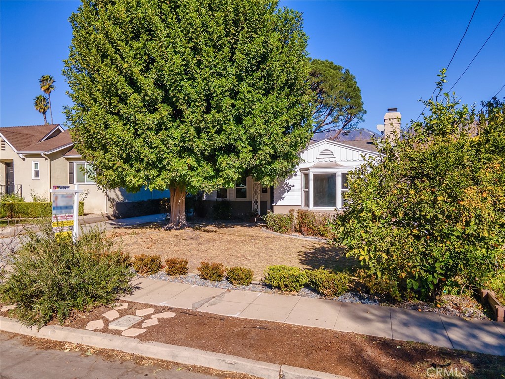 2739 Millicent Way Pasadena, CA 91107 - Photo 37 of 49 a front view of a house with a garden