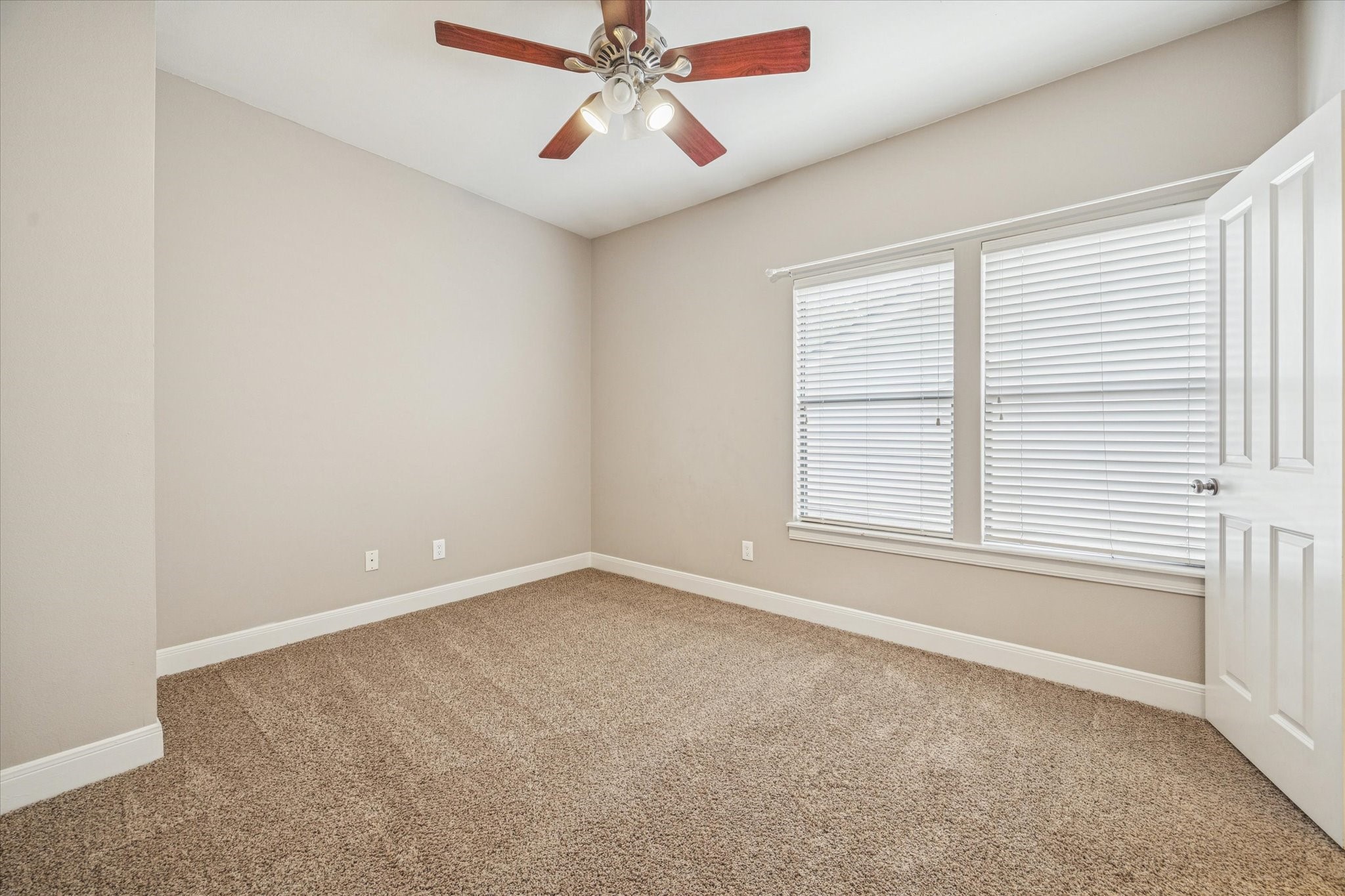 6406 Coppage Street Houston, TX 77007 - Photo 12 of 18 an empty room with a window