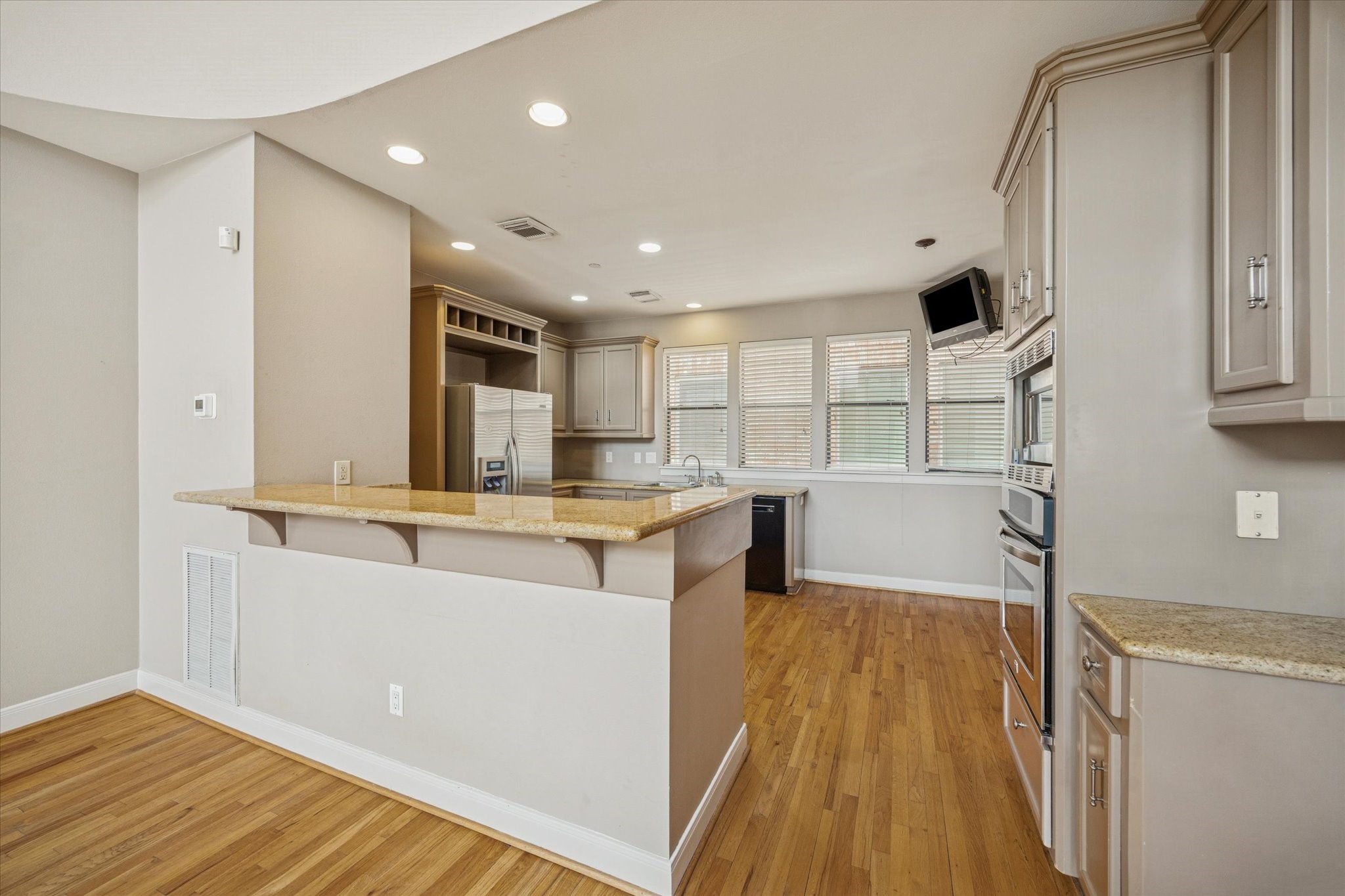 6406 Coppage Street Houston, TX 77007 - Photo 4 of 18 a view of kitchen with cabinets