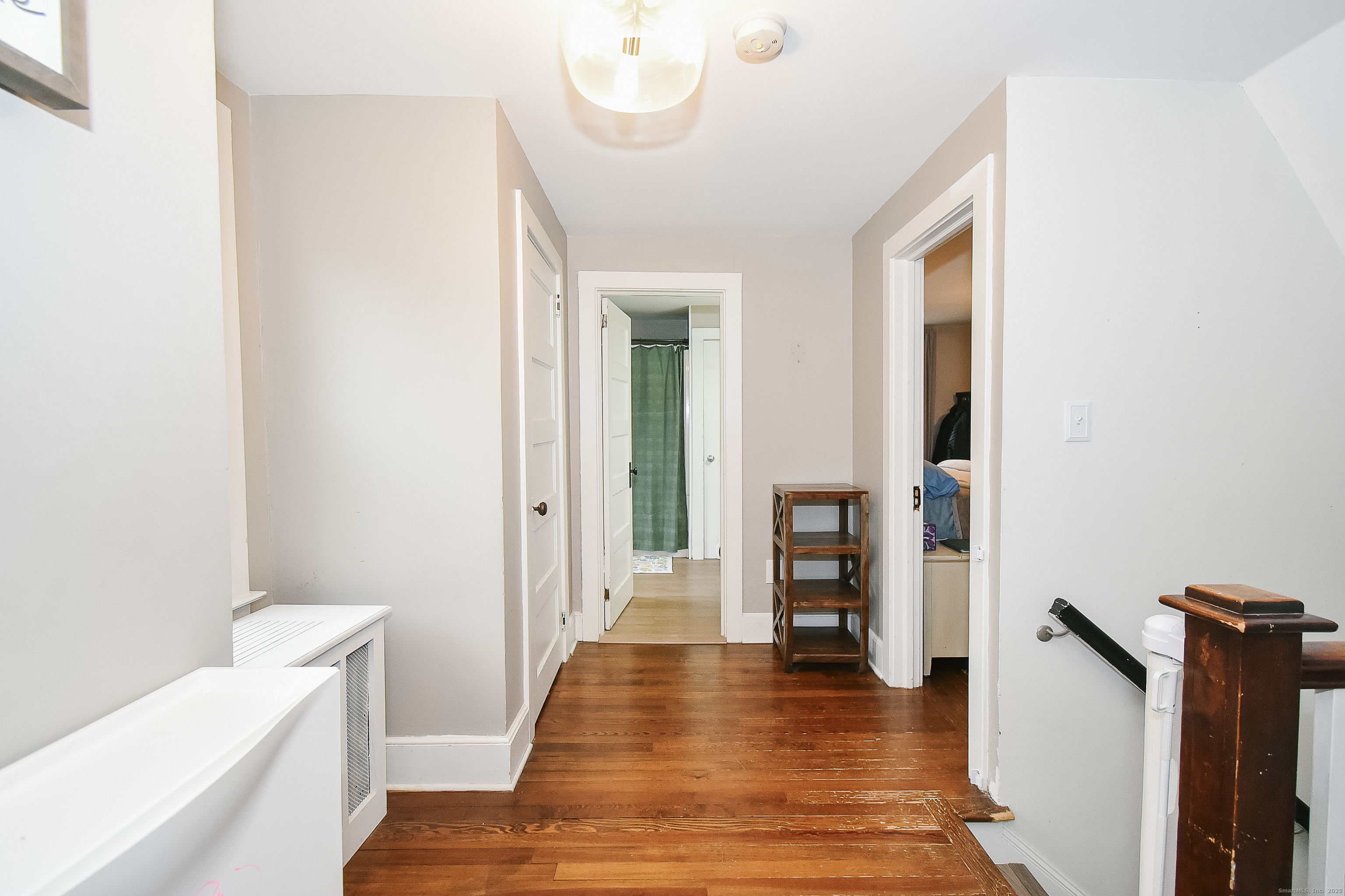 291 Hog Hill Road East Hampton, CT 06424 - Photo 17 of 24 a view of a hallway view with wooden floor and staircase