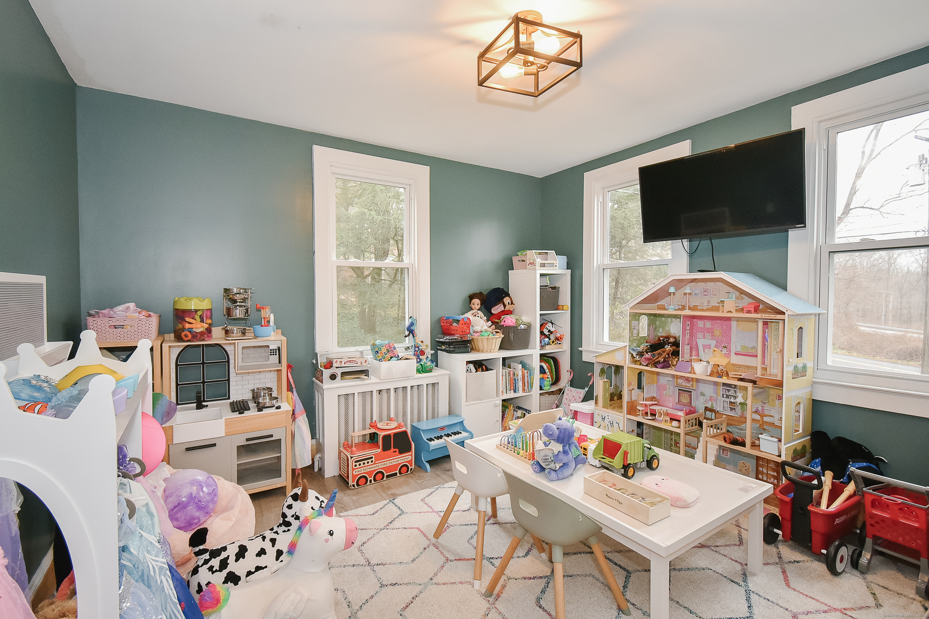 291 Hog Hill Road East Hampton, CT 06424 - Photo 10 of 24 a room with furniture and a flat screen tv