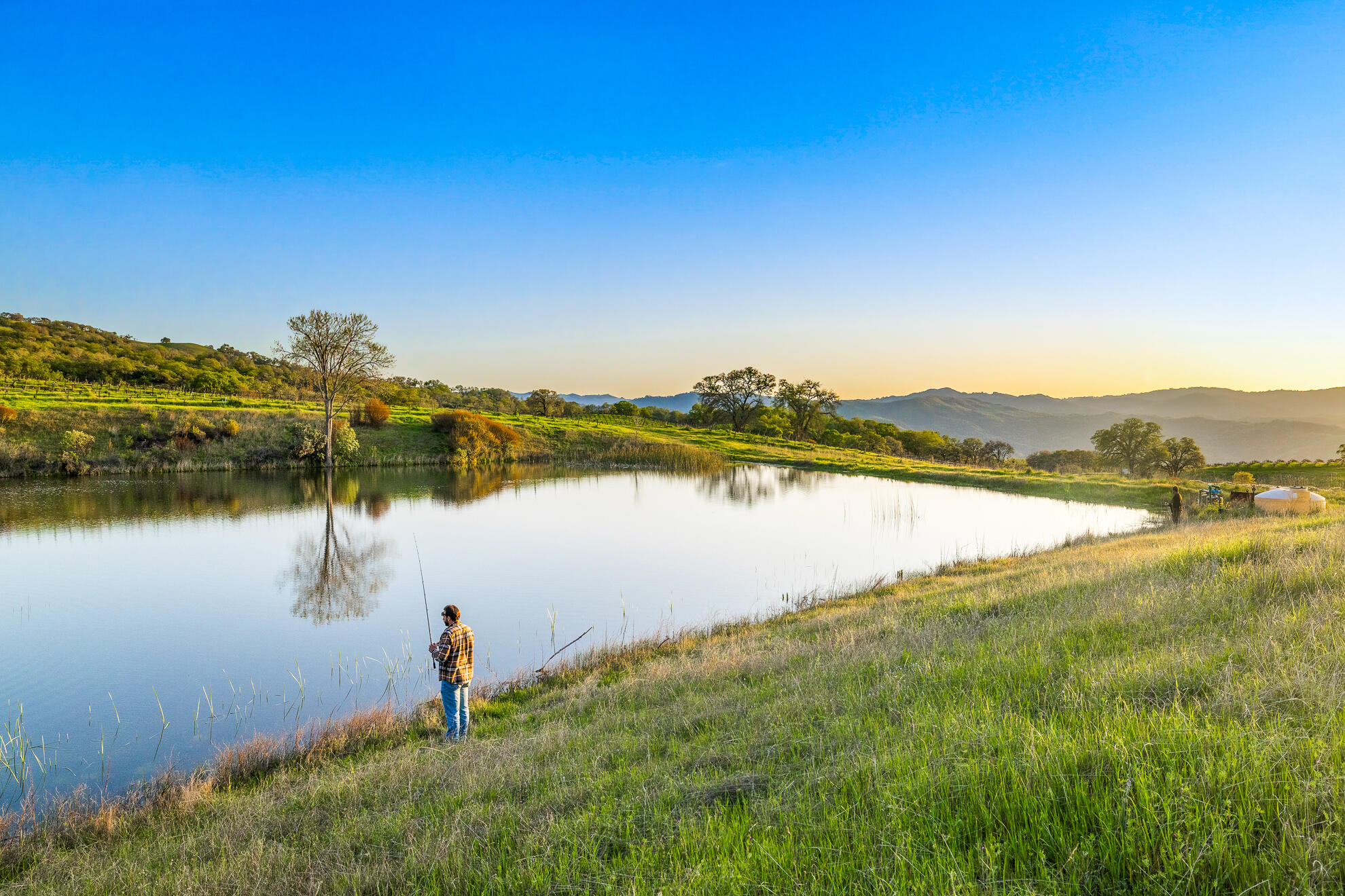 5155 Mill Creek Road Ukiah, CA 95482 - Photo 19 of 51 a view of a lake with houses in the back