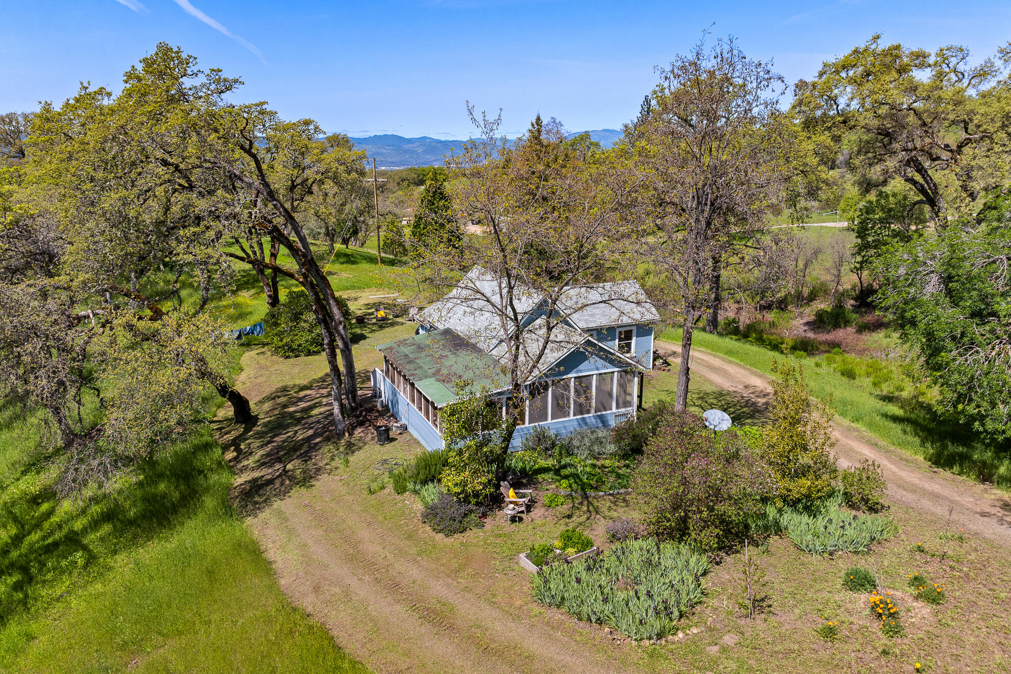 5155 Mill Creek Road Ukiah, CA 95482 - Photo 24 of 51 view of a house with a yard