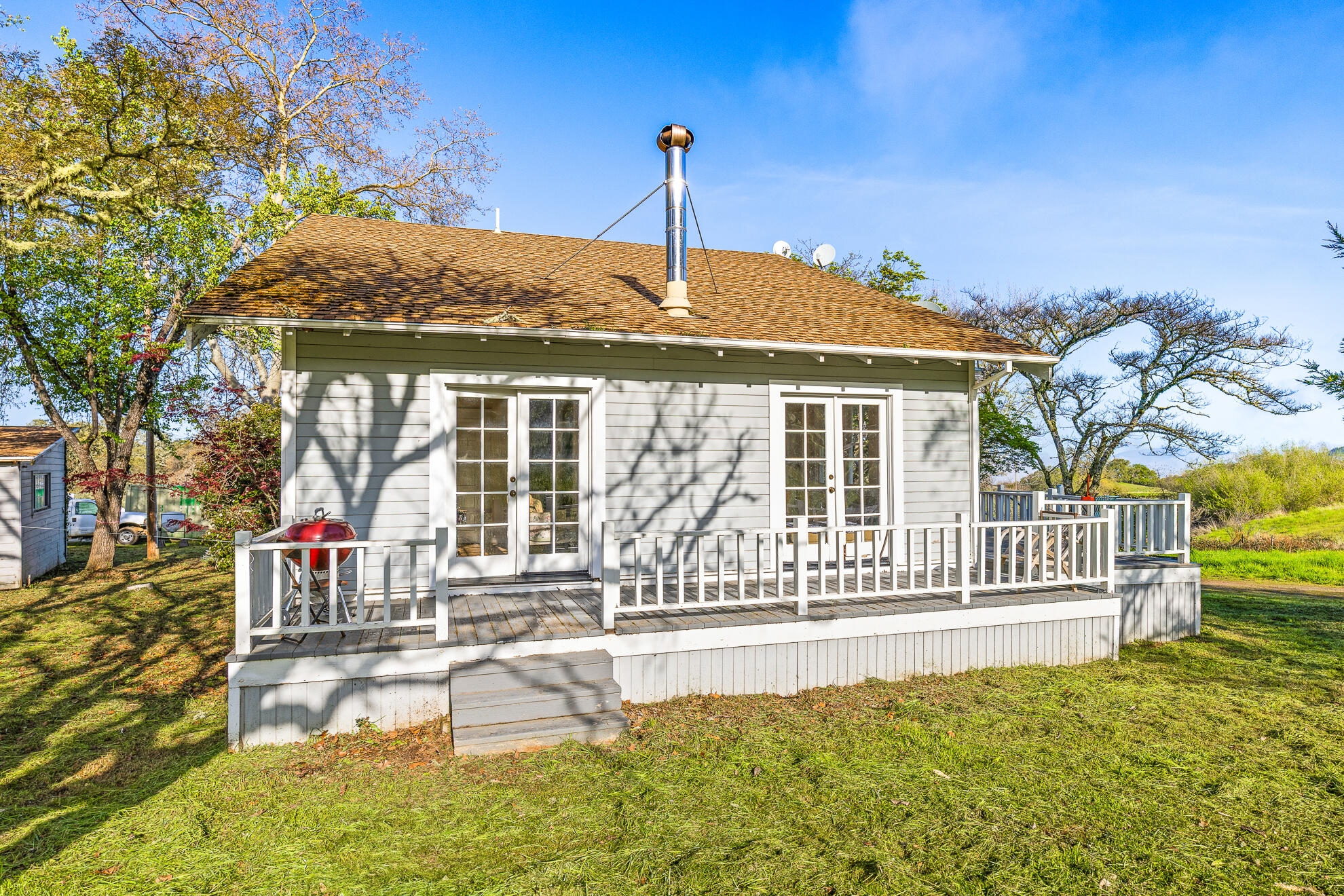 5155 Mill Creek Road Ukiah, CA 95482 - Photo 26 of 51 a front view of a house with a garden