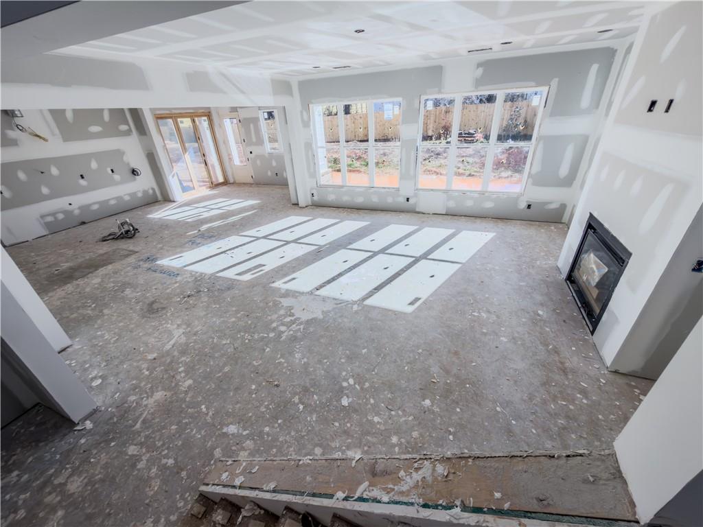 3150 Trickum Road Marietta, GA 30066 - Photo 9 of 19 a living room with furniture and a flat screen tv