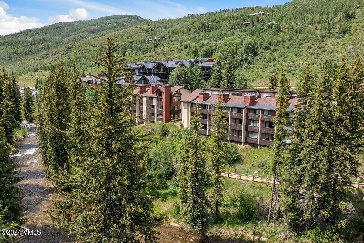 442 South Frontage Road East, Unit A205 Vail, CO 81657 - Photo 22 of 24 an aerial view of a house with a yard