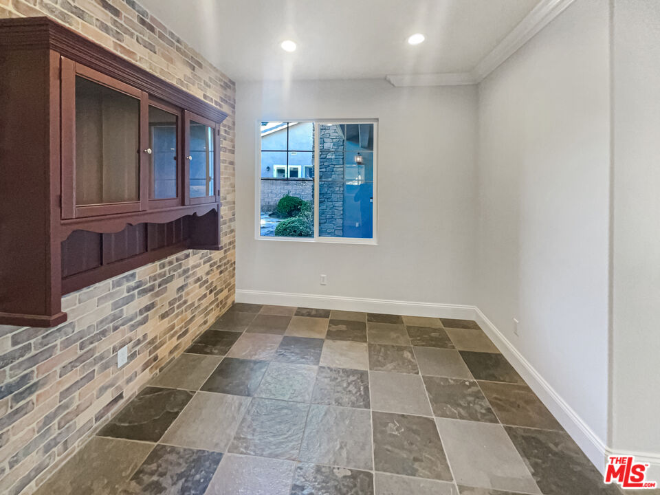 3946 Whistle Train Road Brea, CA 92823 - Photo 16 of 34 a view of an empty room and window