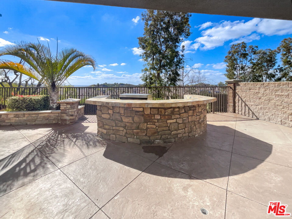 3946 Whistle Train Road Brea, CA 92823 - Photo 20 of 34 a view of a swimming pool with a patio