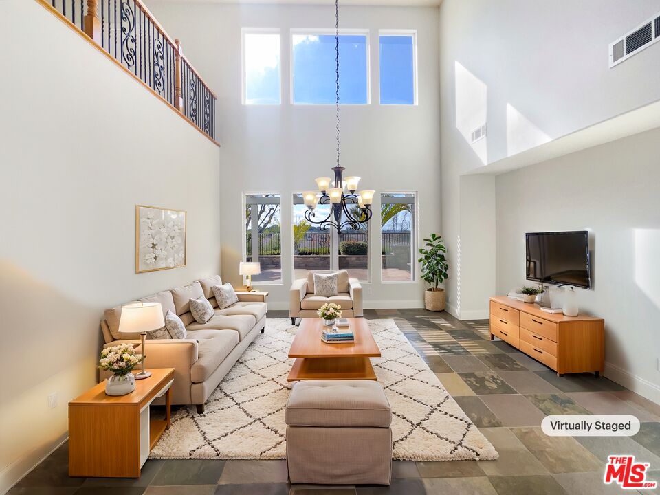 3946 Whistle Train Road Brea, CA 92823 - Photo 2 of 34 a living room with furniture and a flat screen tv