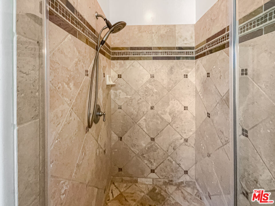 3946 Whistle Train Road Brea, CA 92823 - Photo 28 of 34 a bathroom with a shower