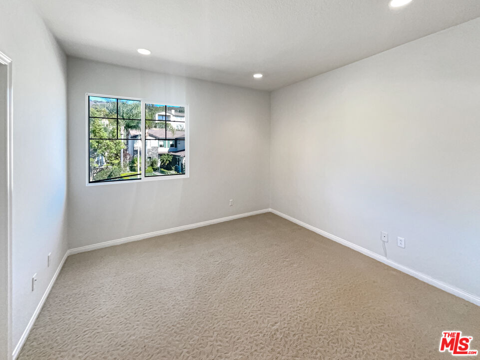 3946 Whistle Train Road Brea, CA 92823 - Photo 30 of 34 an empty room with a window