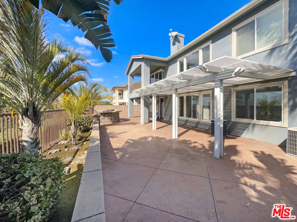 3946 Whistle Train Road Brea, CA 92823 - Photo 8 of 34 a front view of a building with a garden